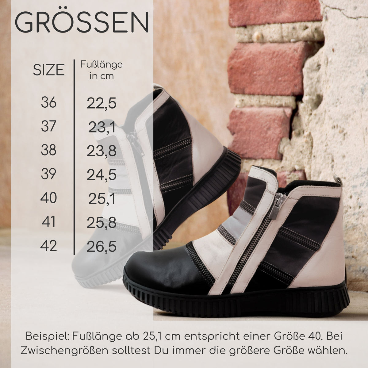 Boot in schwarz, weiß, grau, abgesetzt mit Zierreißverschlüssen seitlich und auf dem Spann - Bild mit Größenskala